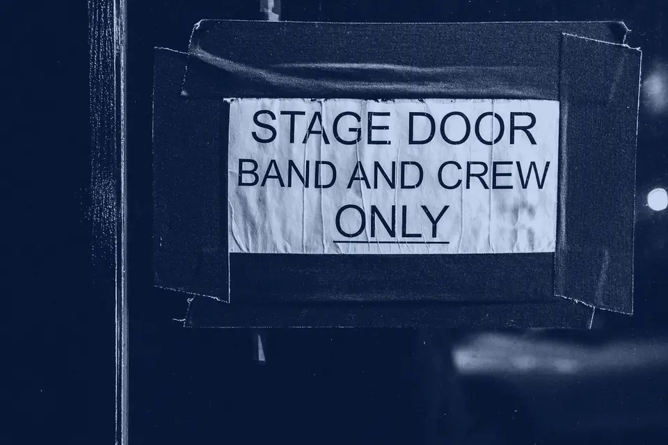 Cartel de puerta de backstage